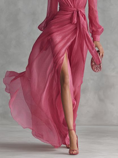 Elegante lange jurk van roze chiffon met parels en een V-hals voor dames